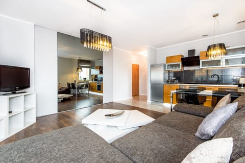 Comfort Apartment | Living area | TV