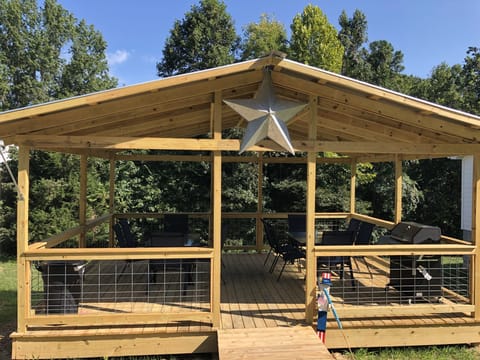 Grilling pavilion that has gas grill and seating for 12 for entertaining