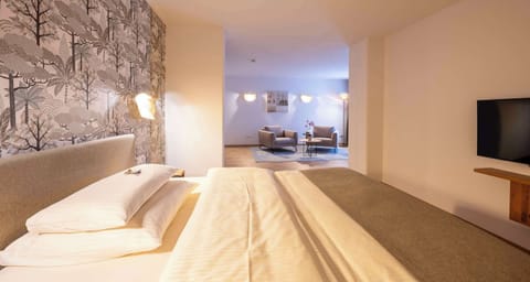 Suite, 1 Queen Bed | In-room safe, individually decorated, desk, laptop workspace