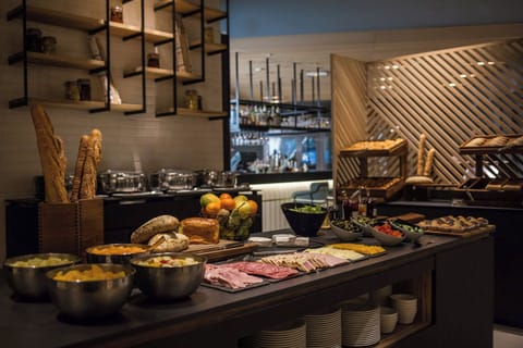 Daily buffet breakfast (EUR 21 per person)