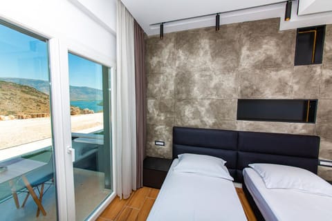 Family Suite, 2 Bedrooms, Balcony | In-room safe, individually furnished, desk, free WiFi