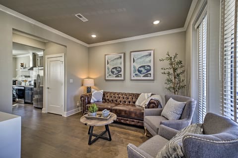 Stylish and comfortable living room with kitchen.