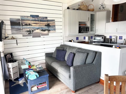 The couch has been rearranged and now faces out to the spectacular views