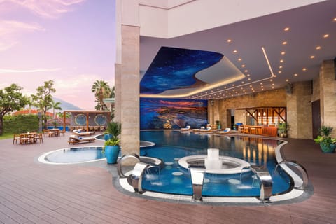Outdoor pool, pool umbrellas, sun loungers