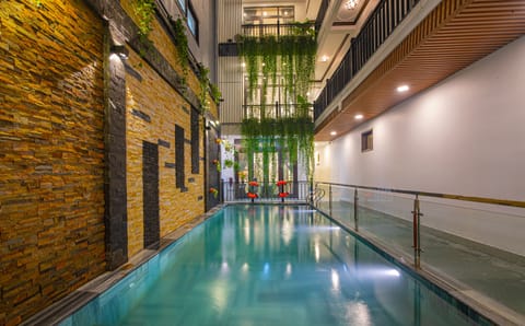 Indoor pool, outdoor pool, open 5:00 AM to 9:00 PM, pool umbrellas