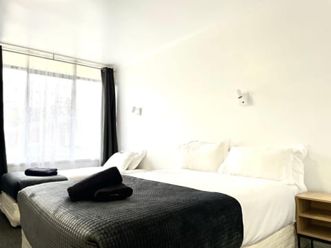 Premium bedding, individually furnished, laptop workspace