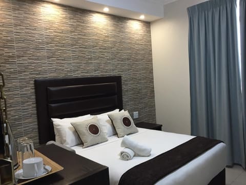Premium bedding, down comforters, individually decorated