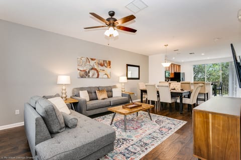 Design Townhome, 3 Bedrooms, Pool Access | Living area | 40-inch TV with cable channels