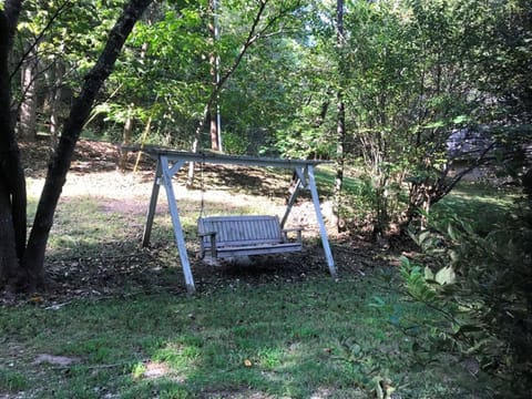 Porch swing to relax after a long day of hiking or canoeing.
