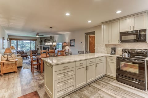 The updated kitchen looks out on the great room.