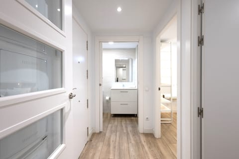 Apartment, 2 Bedrooms | Living area | 65-inch TV with cable channels