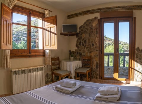 Traditional Double Room, 1 Bedroom, Private Bathroom, Mountain View | 1 bedroom, down comforters, individually decorated, bed sheets