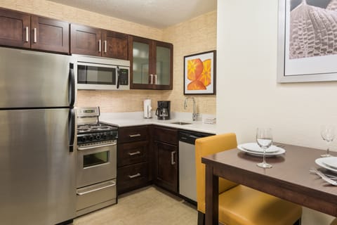 Desk, laptop workspace, blackout drapes, iron/ironing board