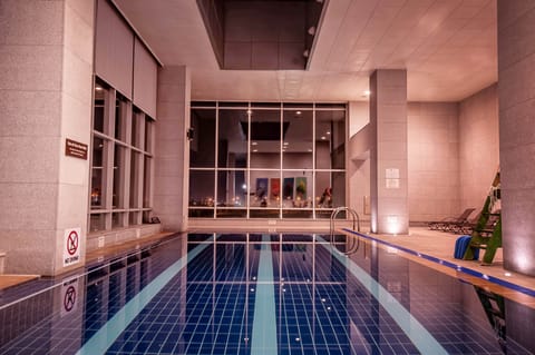 Indoor pool, open 9:00 AM to 6:00 PM, sun loungers