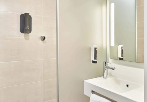 Shower, towels, soap, toilet paper