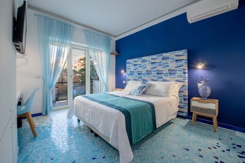 Deluxe Double or Twin Room, 1 Queen Bed, Balcony (Mosaico) | Minibar, in-room safe, individually decorated, individually furnished