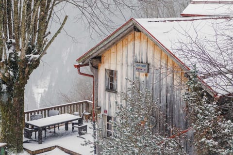 the chalet up close on a winter snow day