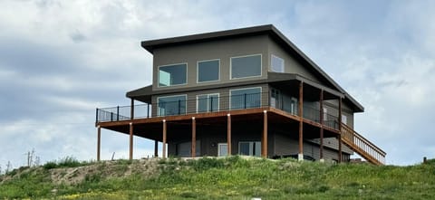 House as you approach from down the hill