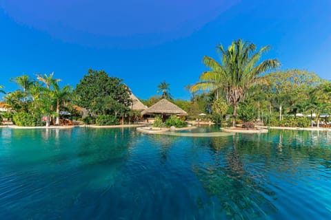 Outdoor pool, open 8:00 AM to 5:00 PM, pool umbrellas