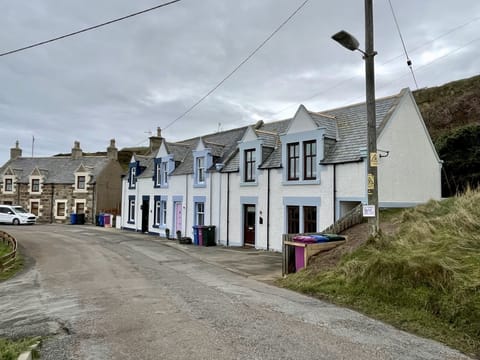 Property exterior - house first on the right 