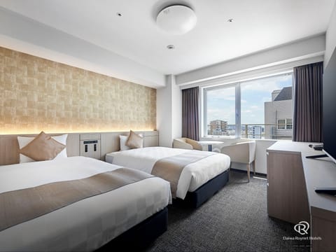 Premium bedding, down comforters, blackout drapes, free WiFi