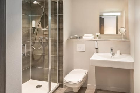 Shower, free toiletries, hair dryer, towels