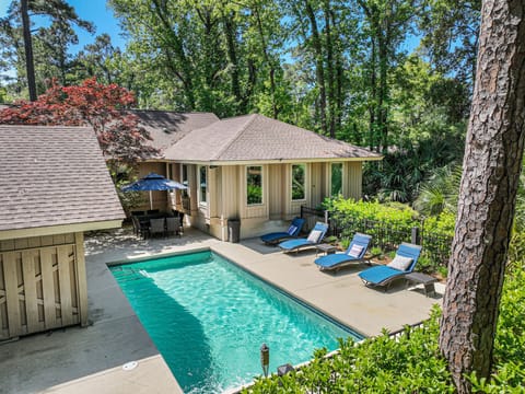Overhead view of the pool and patio. Approximate pool size: 26ft x 12ft. Can heat for additional fee.