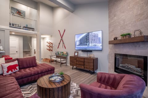 Huge sectional couch, 75" 4K TV, Sonos soundbar, Netflix, Hulu, Amazon and cable