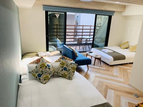 Family room with terrace | Desk, blackout drapes, soundproofing, free WiFi
