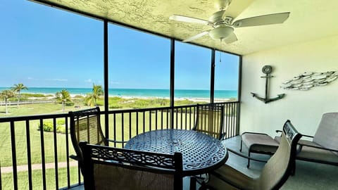 Enjoy coffee, cocktails a good book & more on the gulf view lanai.