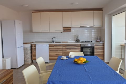 Villa | Private kitchen | Fridge, oven, stovetop, dishwasher