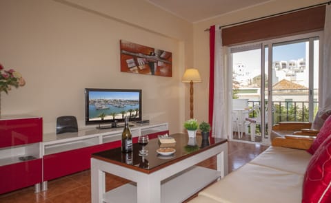 Apartment, 2 Bedrooms, Balcony | Living room | Flat-screen TV