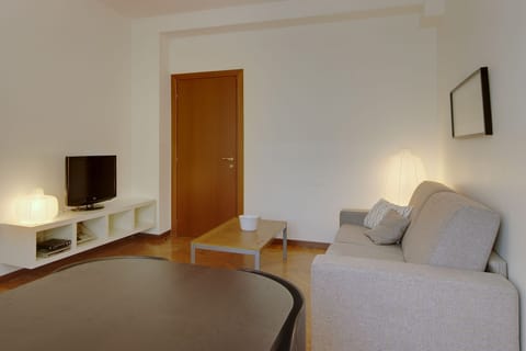 Sink into the cozy sofa after a day exploring the area.