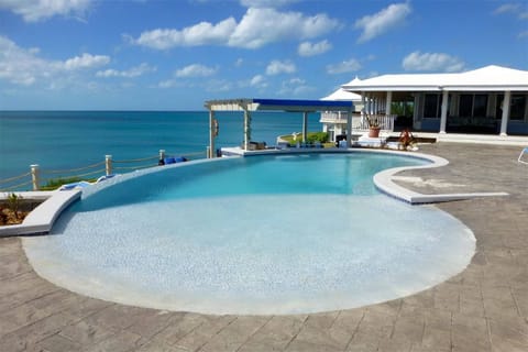 Welcome to Neptune Cove.  Swim in our clifftop infinity edge pool with swim up bar.