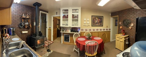 Full Kitchen has electric heater and full size stove and refrigerator.