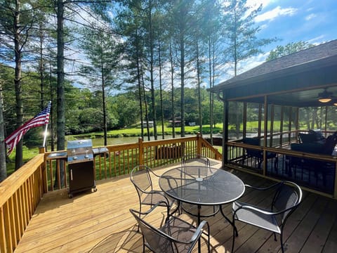 Side Deck w/grill & table and chairs & River View
