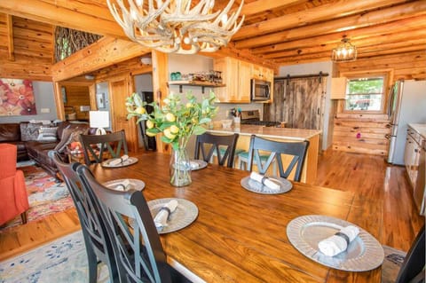 Dining Table seats up to 8 Guests, plus 2 More Bar Stools at adjacent counter top