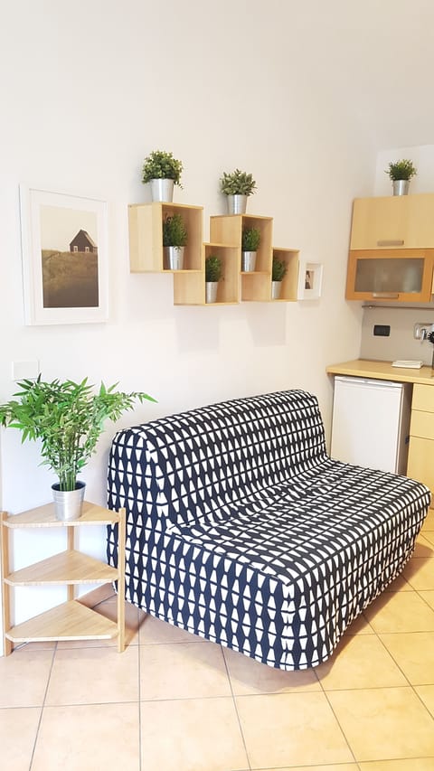 Apartment, 1 Bedroom | Living area | 32-inch flat-screen TV with digital channels, TV