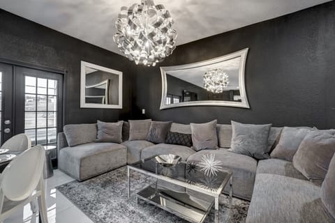 Comfortable and Entertaining living room with open floorplan to socialize with dining room as well. Start with a cocktail and move onto dining in modern social atmosphere catering for your entire family, bachelor/birthday party or corporate retreat.
