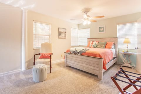 Super comfy oversized bedroom with seperate seating and walk in closet 