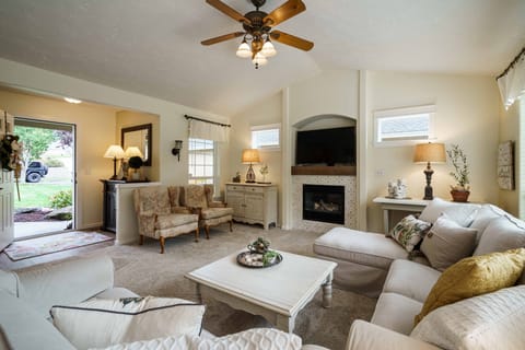 Our living room is spacious with a lot of comfortable seating.