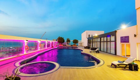 Outdoor pool, open 9:00 AM to 6:00 PM, sun loungers