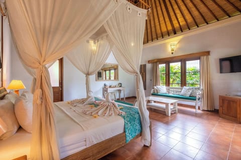 Suite, Garden View | 1 bedroom, minibar, in-room safe, desk