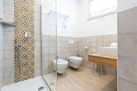 Standard Double Room | Bathroom | Shower, hydromassage showerhead, eco-friendly toiletries, hair dryer