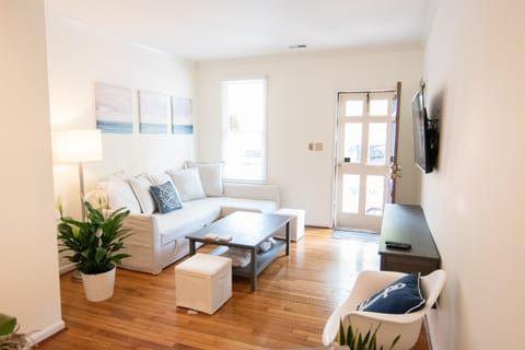 ★ Comfort & Cozi ★ Walk into a cozy living room with a large sofa and big screen smart tv. Sleeper sofa turns into a queen size bed