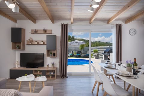 Villa, Private Pool | Living room | Flat-screen TV