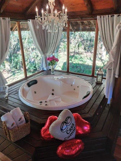 Honeymoon Chalet | Bathroom | Hair dryer, toilet paper