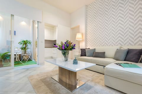 Apartment (2 Bedrooms) | Living area | 32-inch flat-screen TV with cable channels, TV
