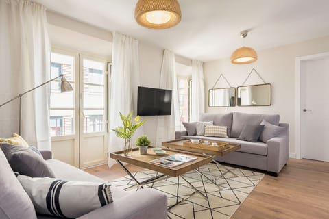 Apartment (3 Bedrooms) | Living area | 32-inch TV with cable channels