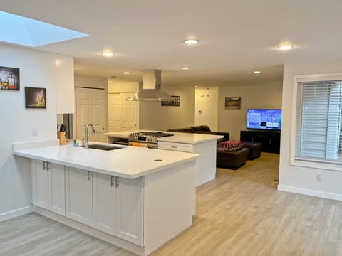 Open concept floorplan - looking at the kitchen from the living/study area
